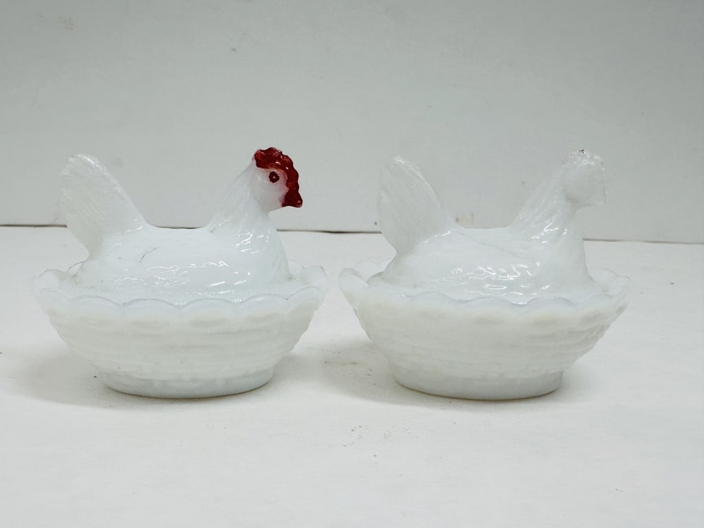 WESTMORELAND MILK GLASS HEN NESTS VINTAGE: A pair of covered milk glass dishes in the Hen on Nest pattern produced by Westmoreland Glass Company. Each vessel is crafted from opaque white glass with a basketweave texture base and bears the stac