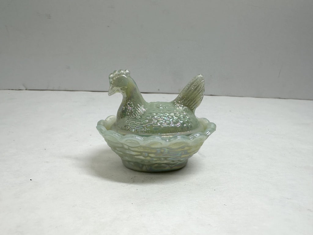 MINI BOYD OPALESCENT CARNIVAL GLASS HEN: Miniature lidded dish produced by Boyd Crystal Art Glass in the form of a hen on nest. The green opalescent glass features an iridescent carnival finish and bears the manufacturer B in a diamond mark 