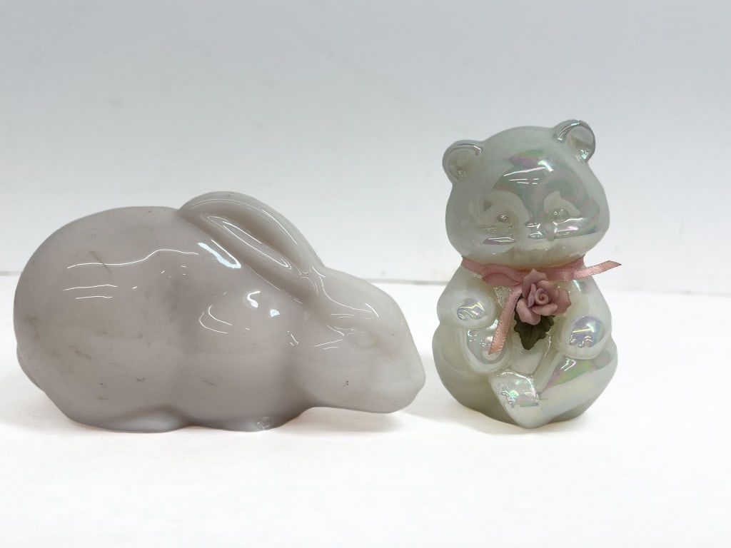 FENTON GLASS ANIMAL FIGURINES 1990S: Two Fenton Art Glass figurines including a lavender glass rabbit and a white opalescent iridescent bear. The bear features an applied porcelain rose and is marked with the Fenton script F and digit