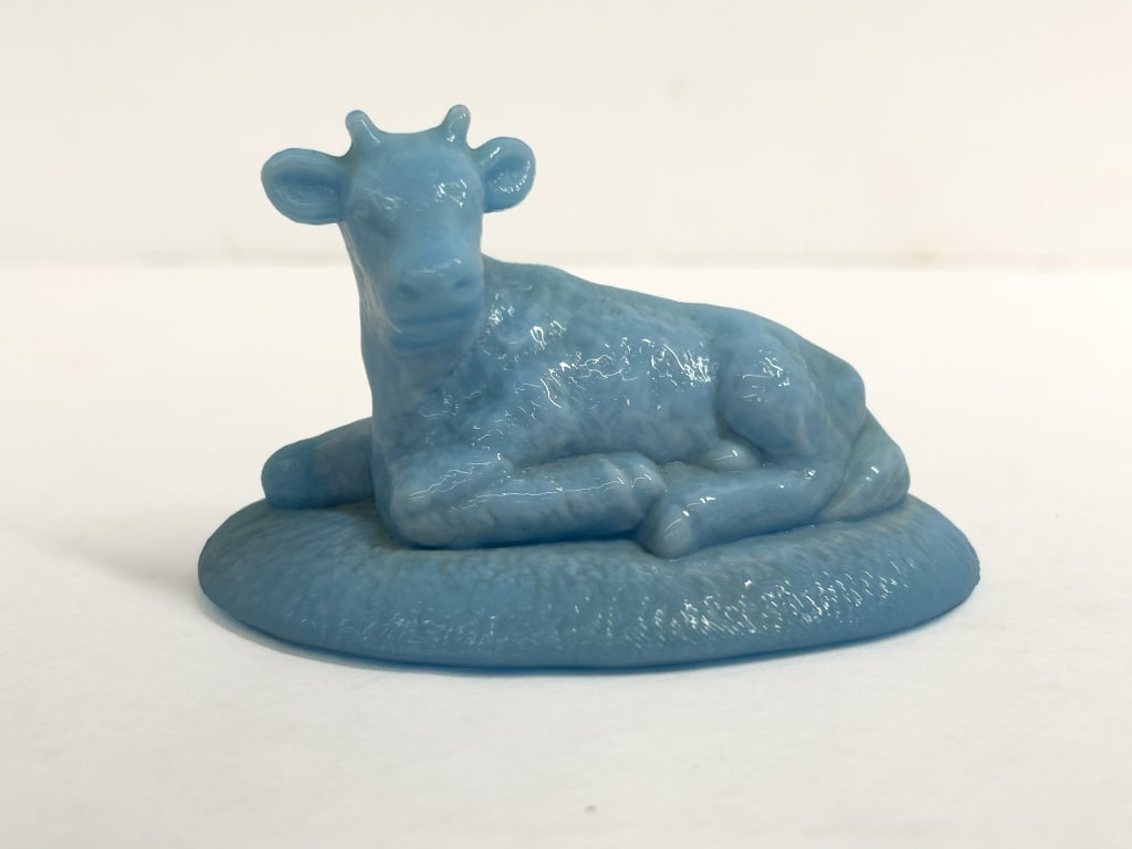 BOYD BLUE SLAG GLASS COW, 1988-1993: Boyd's Crystal Art Glass figurine depicting Mabel the Cow in blue slag marble glass. An embossed diamond mark containing a B with three bars identifies the production period as approximately 1988 to 1