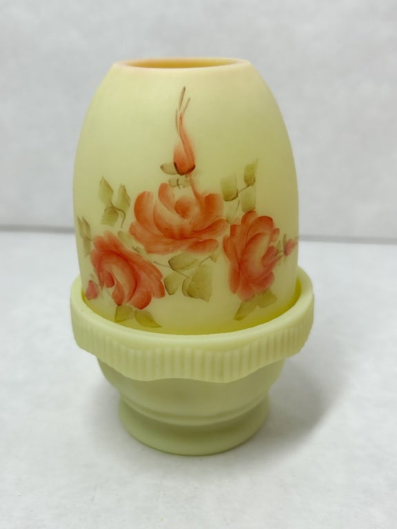 PEGGY BENNETT FENTON CUSTARD FAIRY LAMP, 1978: Two-piece hand-painted custard uranium glass fairy lamp featuring a floral rose motif and satin finish. The interior rim of the dome shade is signed in orange paint HAND PAINTED BY PEGGY BENNETT and
