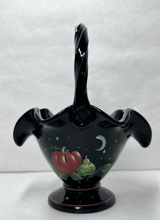 FENTON EBONY GLASS HALLOWEEN BASKET: Vintage Fenton Art Glass Company footed basket in ebony glass decorated with hand-painted pumpkins and celestial motifs. The base features an embossed letter F in an oval, a script signature reading h