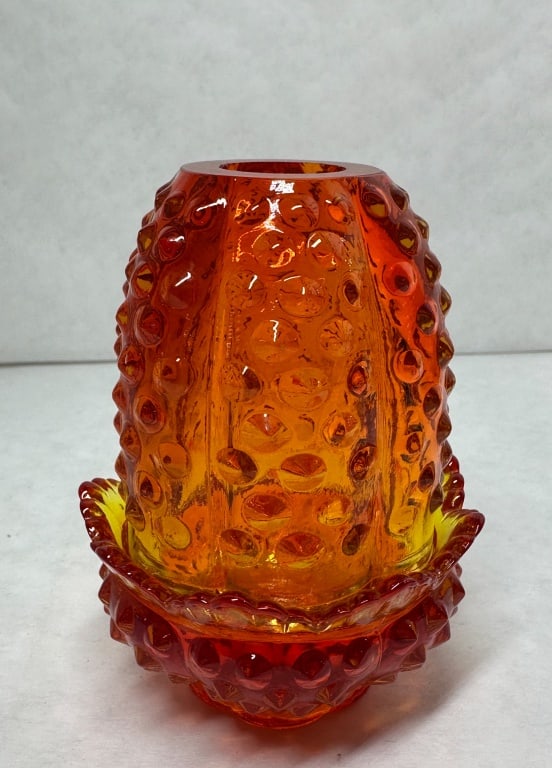 AMBERINA HOBNAIL GLASS FAIRY LAMP: Vintage two-piece fairy lamp in amberina glass with an all-over hobnail pattern. The assembly includes a domed shade and ruffled base, with no visible maker marks or labels on either component.