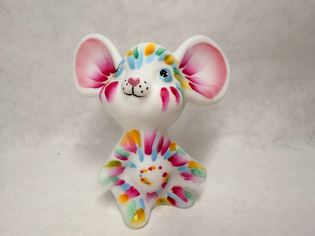 FENTON TIE DYE GLASS MOUSE, 2025 SPINDLER 113/131: A Fenton Art Glass limited edition mouse figurine produced in white satin glass with a hand-painted tie-dye motif. The underside of the base features hand-applied gold ink markings reading FGS 2025 an