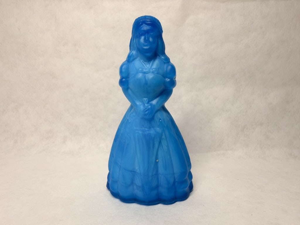 MARBLED BLUE GLASS SOUTHERN BELLE: Decorative figural object crafted from blue and white marbled with a frosted satin finish. The hollow base is unmarked.
