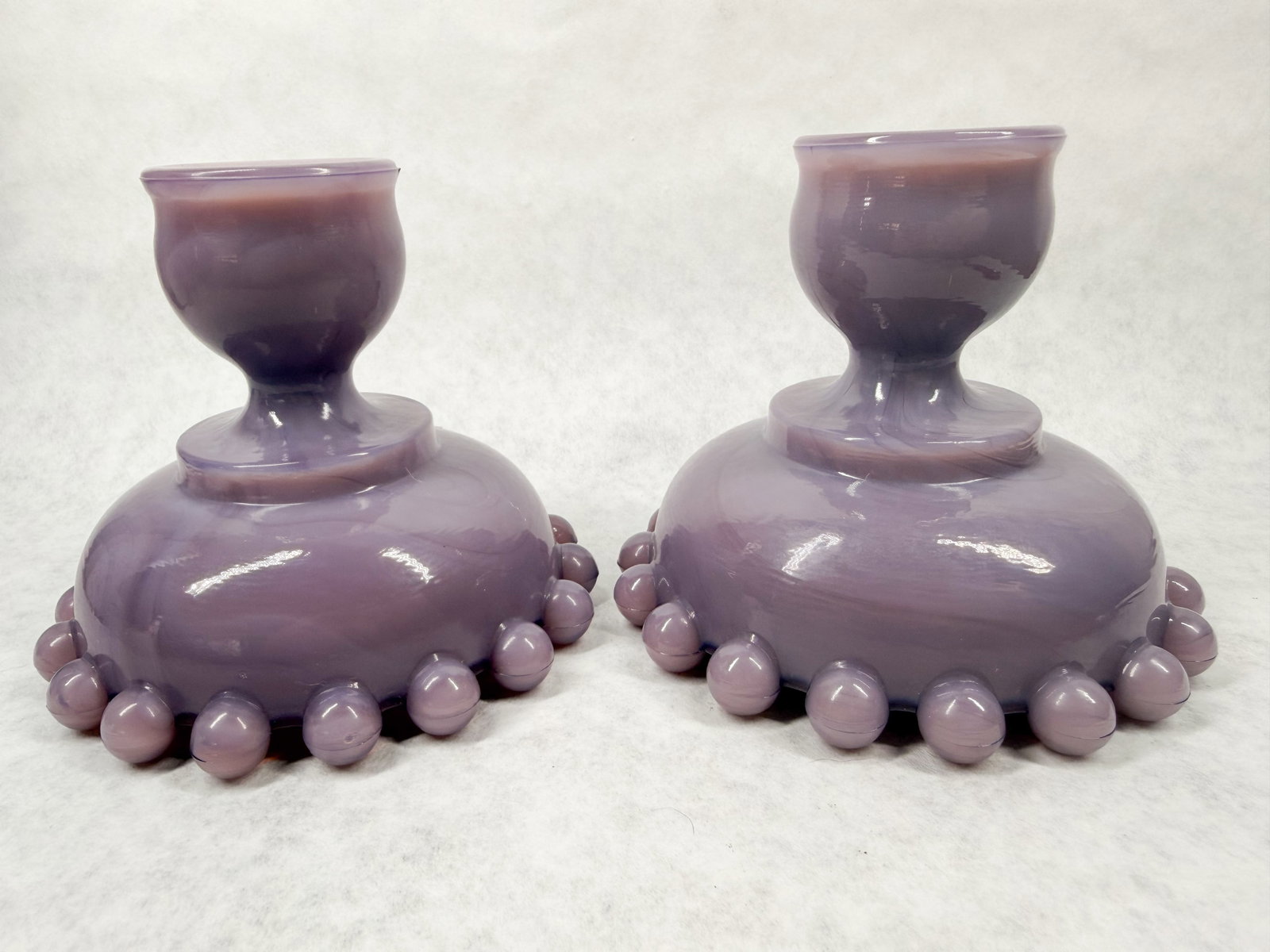 FENTON PURPLE SLAG CANDLESTICKS: .