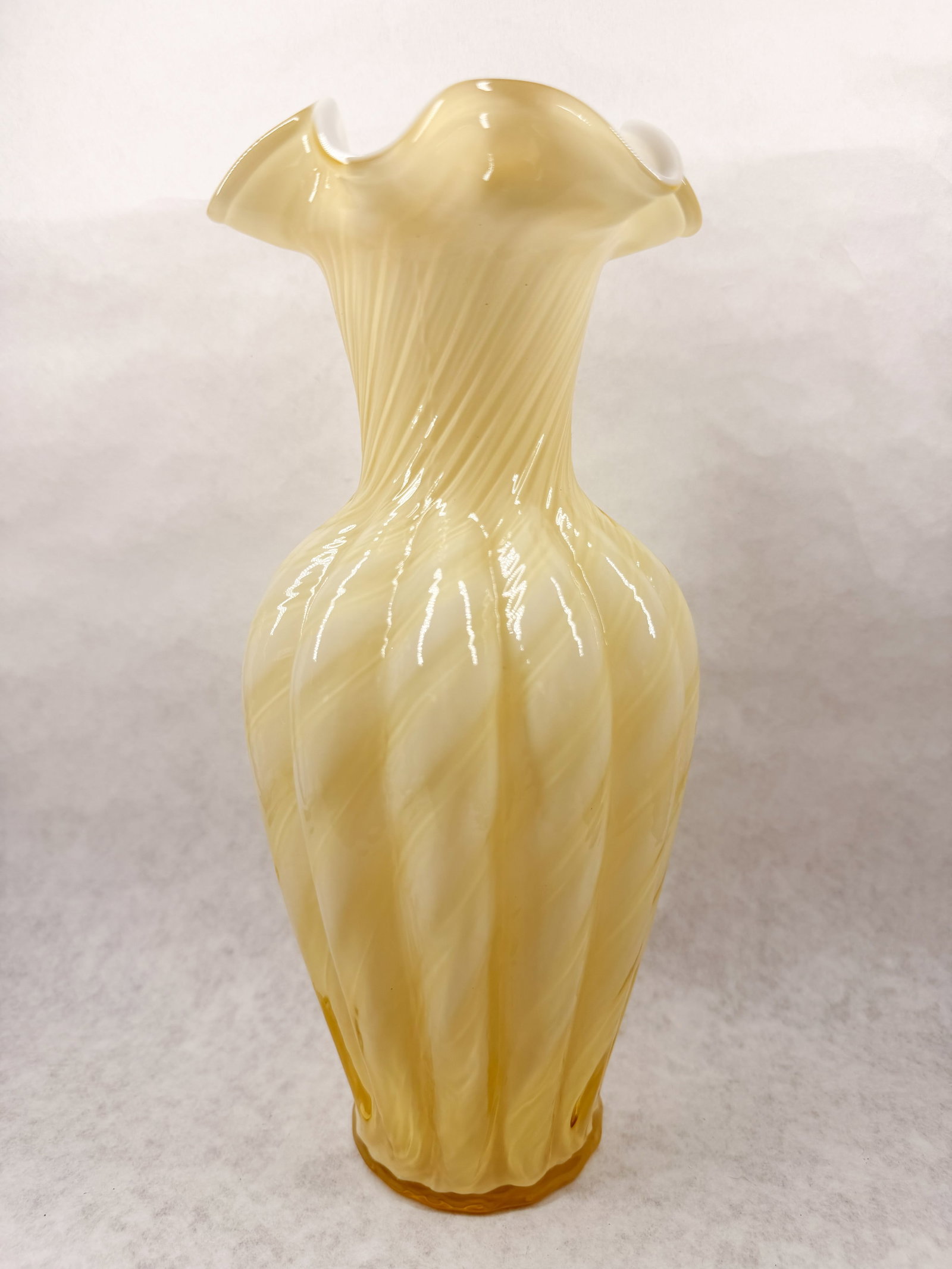 FENTON YELLOW SWIRL RIBBED VASE: .