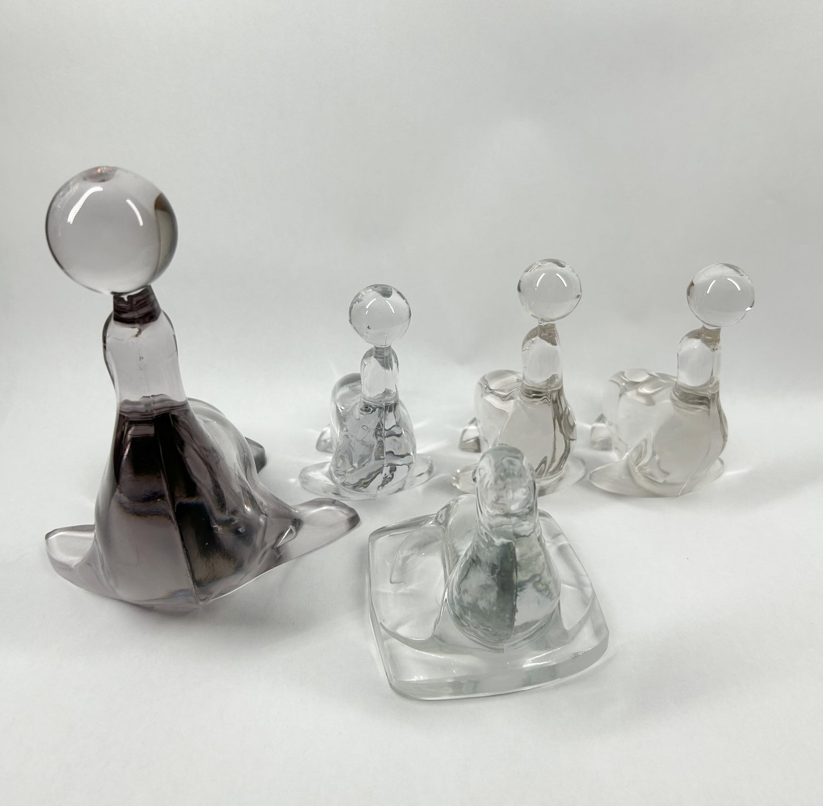 COLLECTION OF GLASS SEAL FIGURINES (1 of 4)