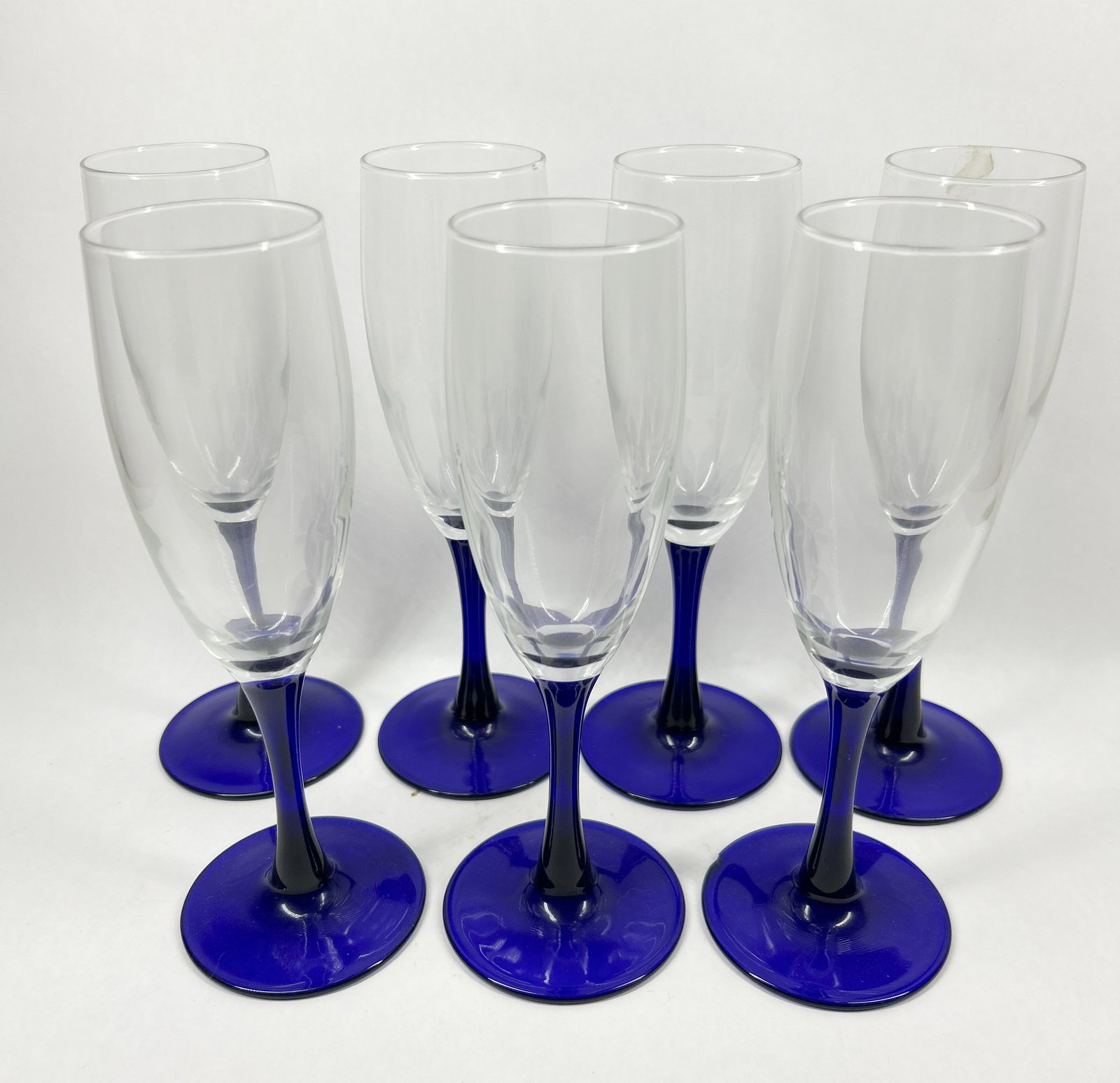 SEVEN COBALT GLASS CHAMPAGNE FLUTES (1 of 2)