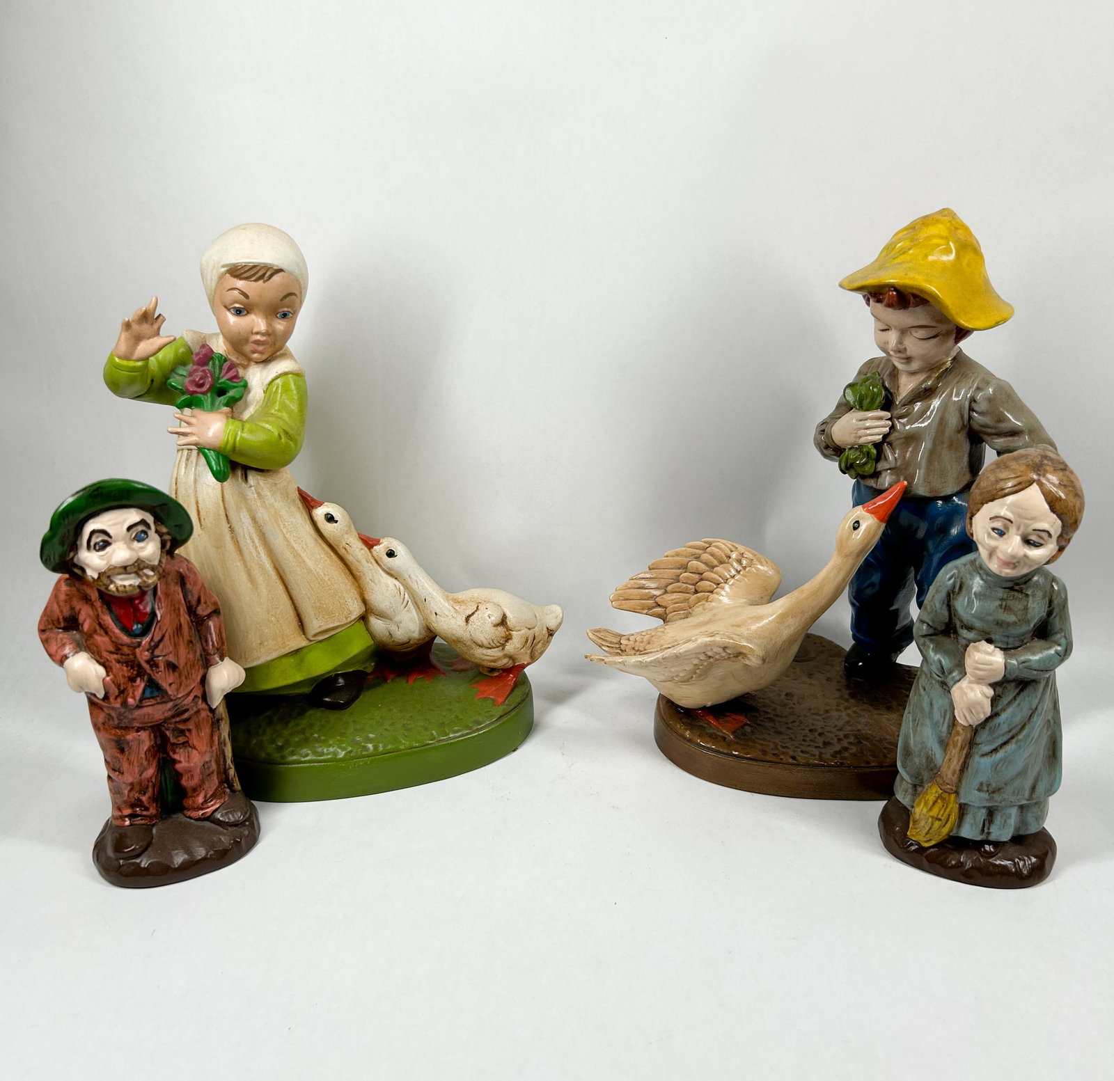 FOUR VINTAGE GLAZED CERAMIC FIGURINES (1 of 3)