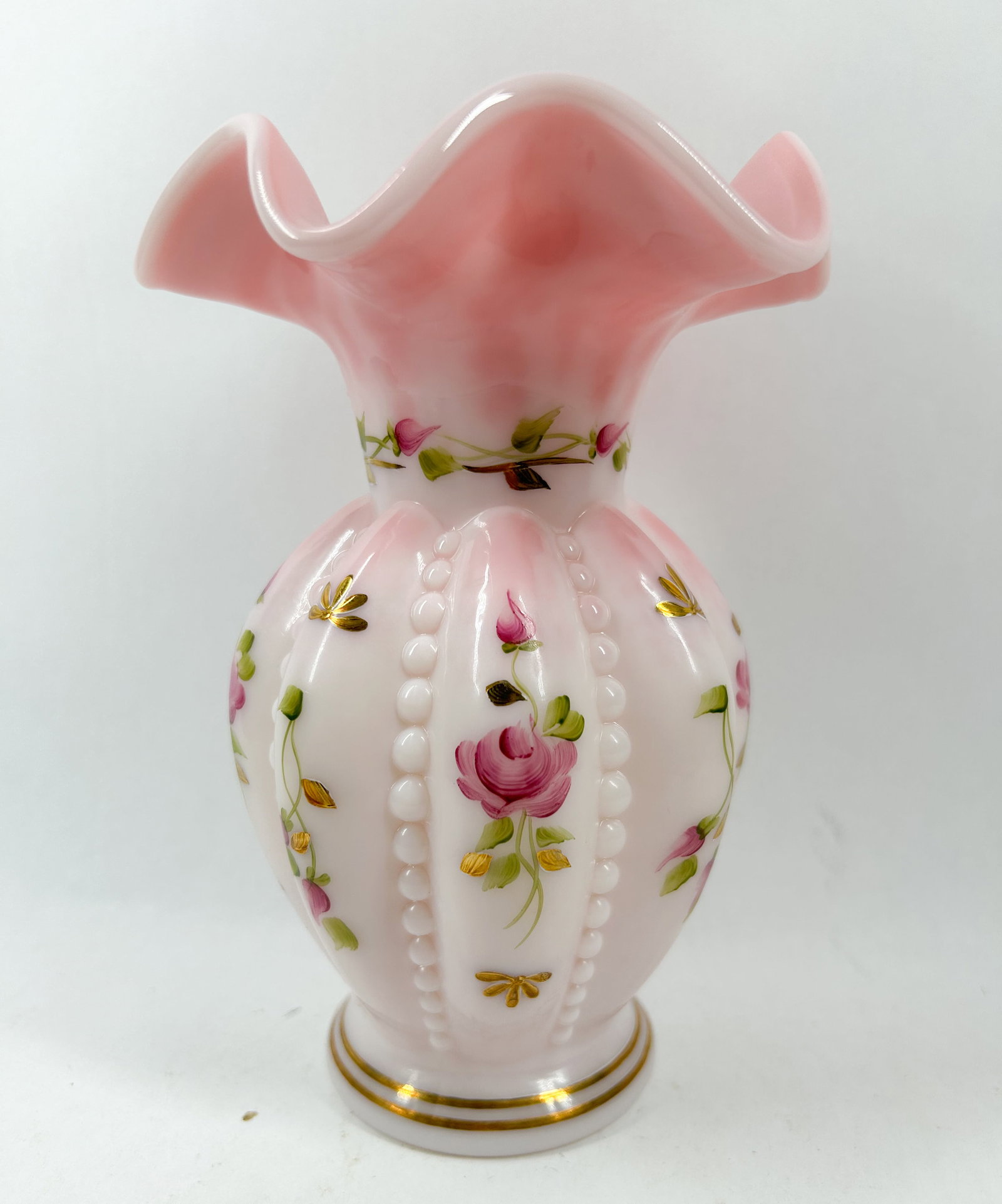 FENTON ROSALENE CHARLETON COLLECTION VASE 2002: Fenton Art Glass Rosalene vase from the 2002 Charleton Collection, featuring a ruffled rim and hand-painted floral motifs by L. Everson. The base bears a green printed script F logo in an oval, a