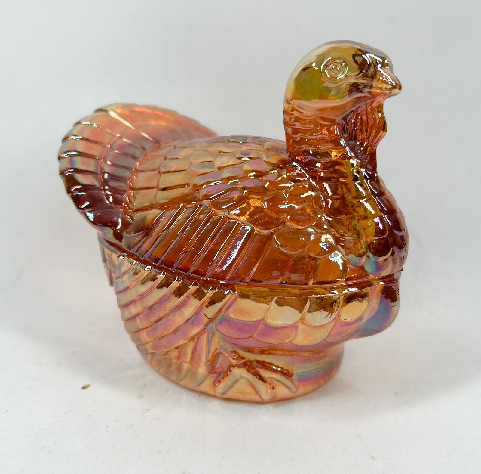 IMPERIAL GLASS MARIGOLD TURKEY DISH: A vintage two-piece turkey candy dish produced by Imperial Glass Company in iridescent marigold carnival glass. The interior base is molded with a mark consisting of a capital letter I with a
