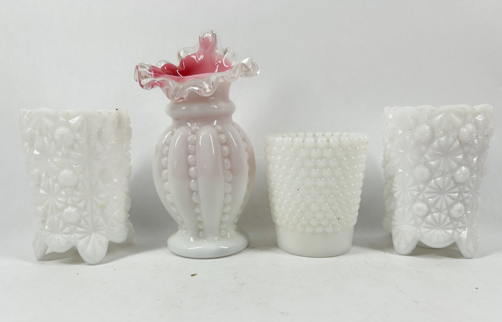 FOUR VINTAGE MILK AND CASED GLASS PIECES (1 of 2)