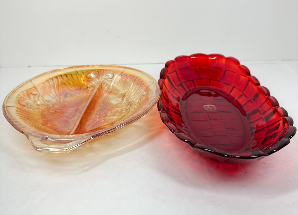DALZELL-VIKING AND CARNIVAL GLASS BOWLS: A Dalzell-Viking ruby red bowl and a marigold carnival glass dish. The ruby bowl displays a circular adhesive label reading DALZELL HANDMADE VIKING USA on the interior base, and the footed relish dish
