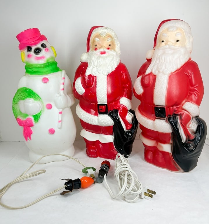 EMPIRE PLASTIC CHRISTMAS BLOW-MOLDS 1968: Empire Plastic Corp. three molded plastic holiday decorations comprising two Santas and one snowman. The figures are marked with an impressed copyright EMPIRE PLASTIC CORP. 1968 MADE IN U.S.A., a
