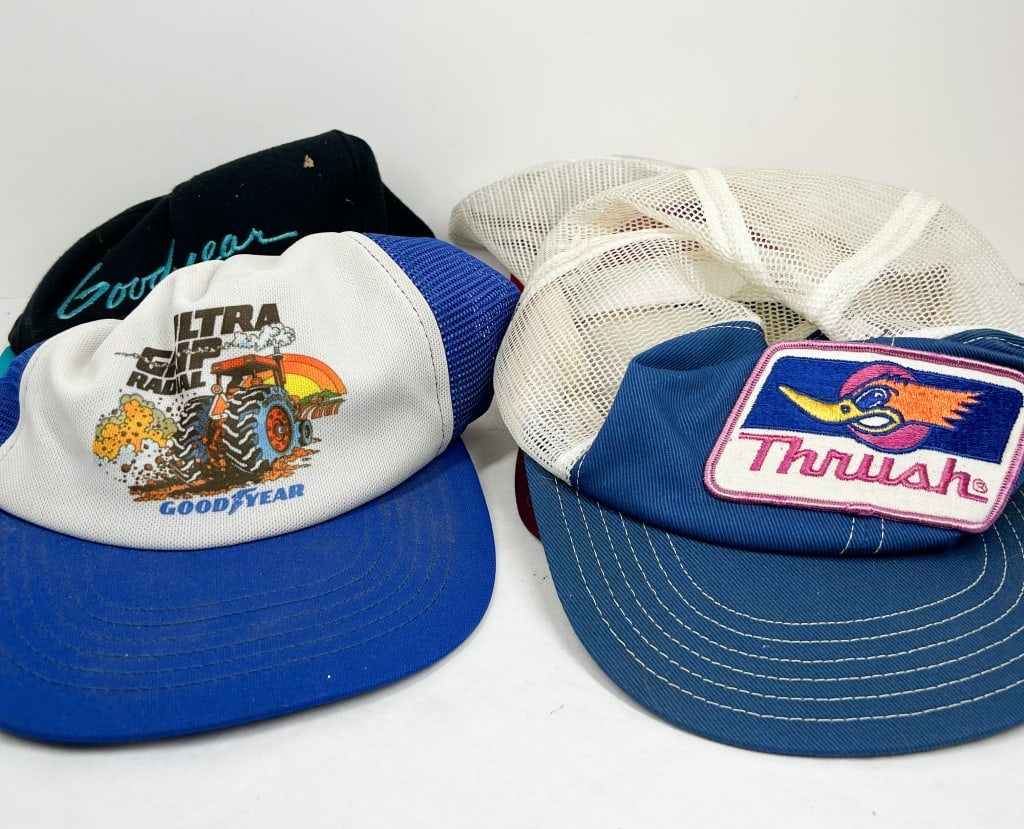SEVEN VINTAGE ADVERTISING CAPS, 1980S (1 of 4)