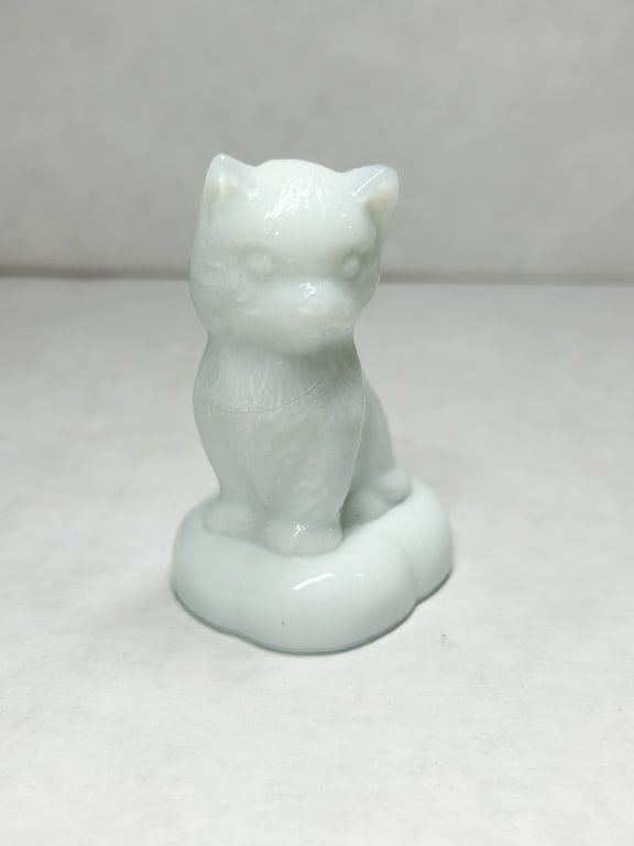 BOYD WHITE SITTING KITTEN ON PILLOW: Seated cat figurine in opaque white milk glass with molded fur texture.
