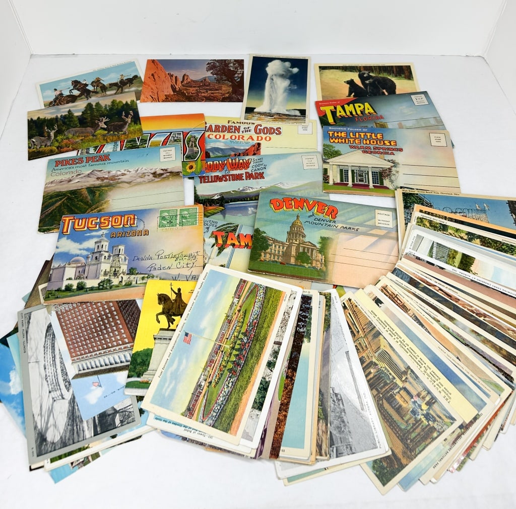COLLECTION OF AMERICAN TOPOGRAPHICAL LINEN POSTCARDS, MID-20TH CENTURY: A large grouping of vintage travel postcards featuring United States landmarks, wildlife, and scenic views. The collection consists primarily of linen and early chrome era cards, including lithographi