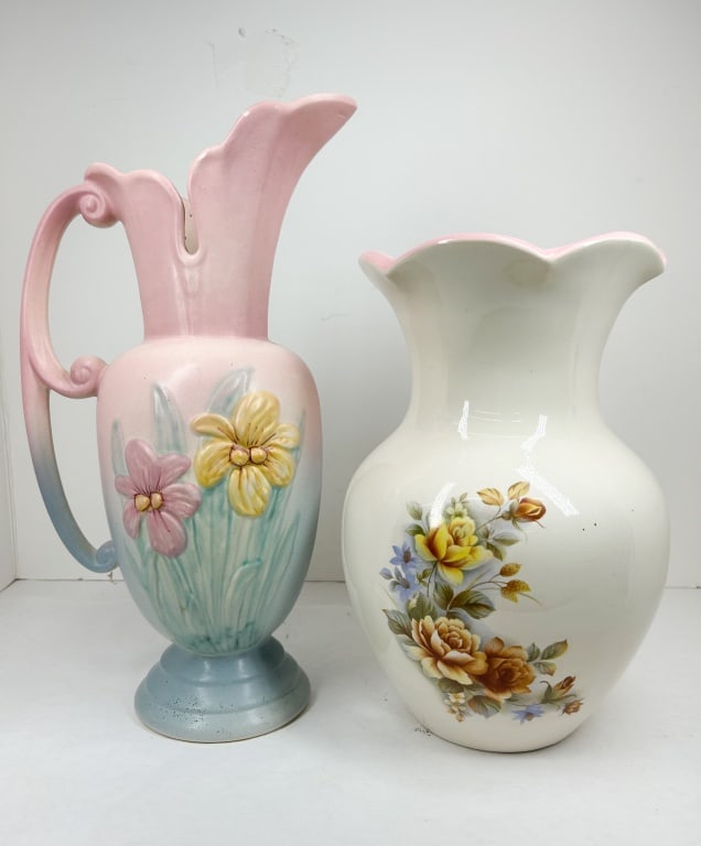 HULL POTTERY WILDFLOWER IRIS EWER: Two American earthenware pitchers, featuring a tall ewer and a bulbous floral pitcher. The ewer is impressed on the base HULL USA 401-13 1/2, identifying it as the Iris pattern from the Wildflower lin