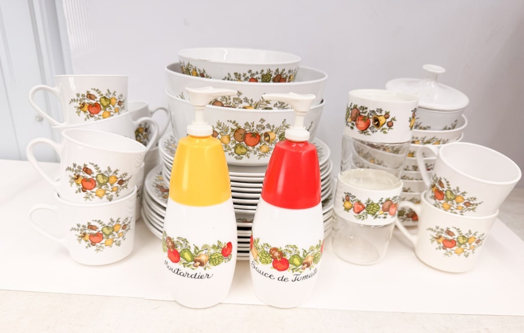 CENTURA BY CORNING, CERAMIC DINNERWARE SET: A collection of white glass-ceramic dinnerware and accessories in the "Summer Delight" pattern. The set features a transfer-printed motif of garden vegetables and herbs, including tomatoes, peppers, m