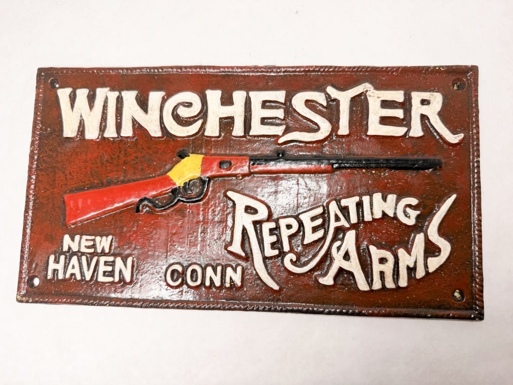 WINCHESTER CAST IRON ADVERTISING SIGN (1 of 2)
