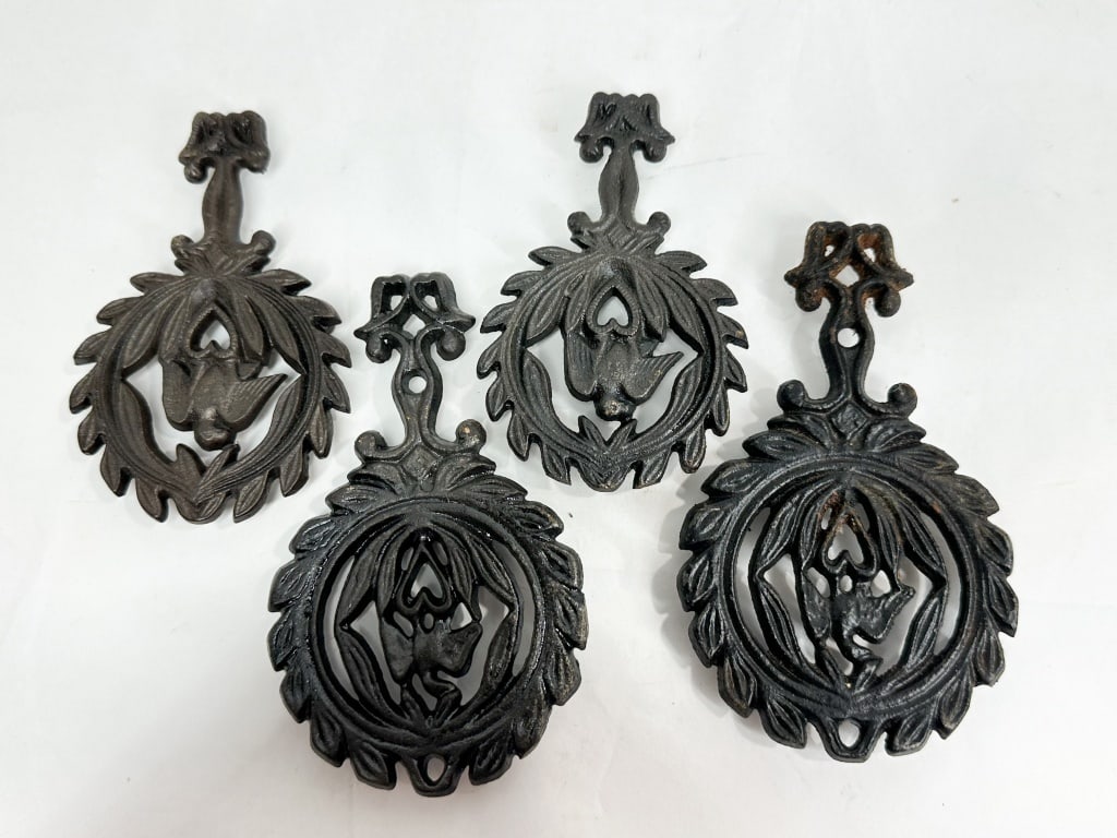 SET OF CAST IRON BIRD TRIVETS (1 of 4)