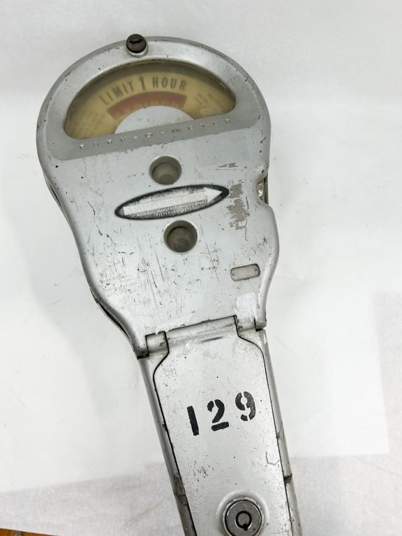 ROCKWELL PARK-O-METER PARKING METER HEAD: A vintage coin-operated parking meter head manufactured by the Rockwell Manufacturing Company. The cast aluminum housing features a front oval label reading INSERT COINS HERE, ROCKWELL MANUFACTURING C