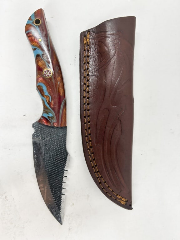 DAMASCUS FIXED-BLADE STEEL FILE KNIFE: A handmade fixed-blade utility knife crafted from a repurposed double-cut metal steel file. The full-tang construction features contoured synthetic composite scales in a copper and turquoise swirl pat