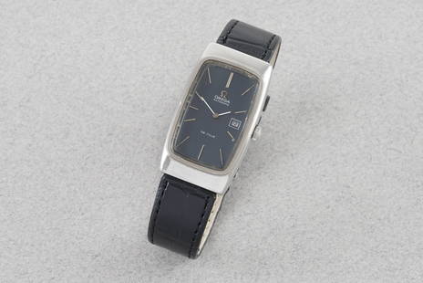 OMEGA DE VILLE AUTOMATIC DATE TANK WRISTWATCH: OMEGA DE VILLE AUTOMATIC DATE TANK WRISTWATCH, this watch is fitted with a rectangular blue dial with hour markers and hands. The 24x45mm stainless steel case is fitted with a crown and a case back.