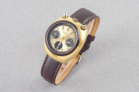 CITIZEN AUTOMATIC BULLHEAD CHRONOGRAPH: CITIZEN AUTOMATIC BULLHEAD CHRONOGRAPH, this watch is fitted with a circular champagne dial with hour markers and hands. The 38mm gold plated case is fitted with a crown, two pushers and a case back.