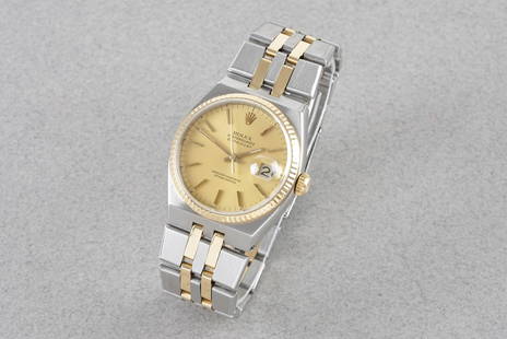 ROLEX OYSTERQUARTZ DATEJUST STEEL & GOLD REF. 17013 CIRCA 1984.: ROLEX OYSTERQUARTZ DATEJUST STEEL & GOLD REF. 17013 CIRCA 1984, this watch is a ref. 17013 and is fitted with a circular champagne dial with stick hour markers and hands. The 36mm stainless steel