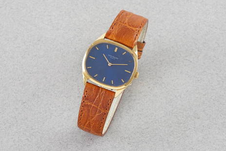 PATEK PHILIPPE 18CT GOLD WRISTWATCH REF. 3545: PATEK PHILIPPE 18CT GOLD WRISTWATCH REF. 3545, this watch is a ref. 3545 and is fitted with an oval blue dial with gold hour markers and hands. The 32mm 18ct gold case is fitted with a crown and a