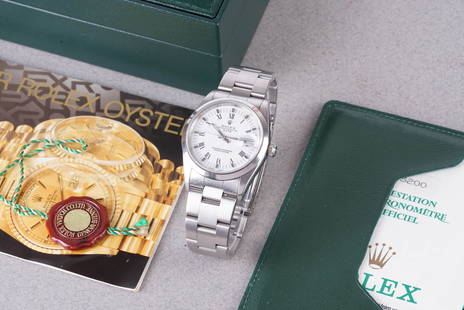 ROLEX OYSTER PERPETUAL DATE W/ BOX & PAPERS REF. 15200 CIRCA 1990: ROLEX OYSTER PERPETUAL DATE W/ BOX & PAPERS REF. 15200 CIRCA 1990, this watch is a ref. 15200 and is fitted with a circular white dial with hour markers and hands. The 34mm stainless steel case