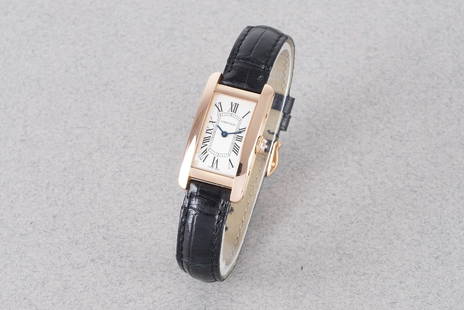 CARTIER TANK AMERICAINE 18CT ROSE GOLD W/ GUARANTEE PAPERS REF. 2503 CIRCA 2016: CARTIER TANK AMERICAINE 18CT ROSE GOLD W/ GUARANTEE PAPERS REF. 2503 CIRCA 2016, this watch is a ref. 2503 and is fitted with a rectangular dial with hour markers and hands. The 20x35mm 18ct rose