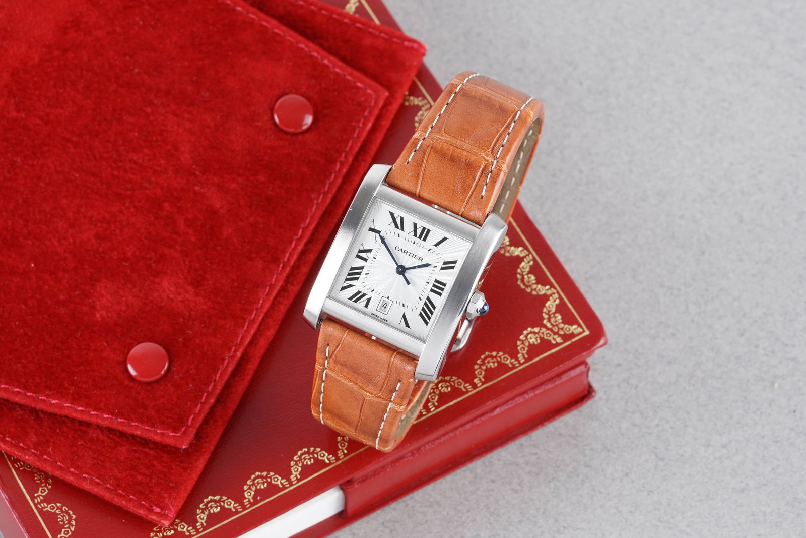 CARTIER TANK FRANCAISE XL AUTOMATIC W/ POUCH & GUARANTEE PAPERS REF. W5101755 2564 CIRCA 2002: CARTIER TANK FRANCAISE XL AUTOMATIC W/ POUCH & GUARANTEE PAPERS REF. W5101755 2564 CIRCA 2002, this watch is a ref. W5101755 and is fitted with a square guilloche dial with hour markers and