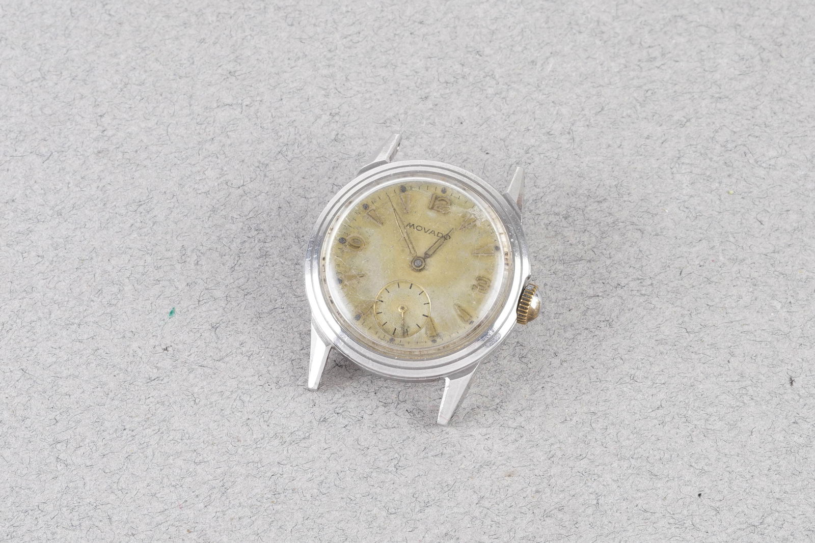 *TO BE SOLD WITHOUT RESERVE* MOVADO STEPPED WRISTWATCH: *TO BE SOLD WITHOUT RESERVE* MOVADO STEPPED WRISTWATCH, 30mm stainless steel stepped case, manually wound movement, this is sold as spares and repairs, not currently running missing case back.