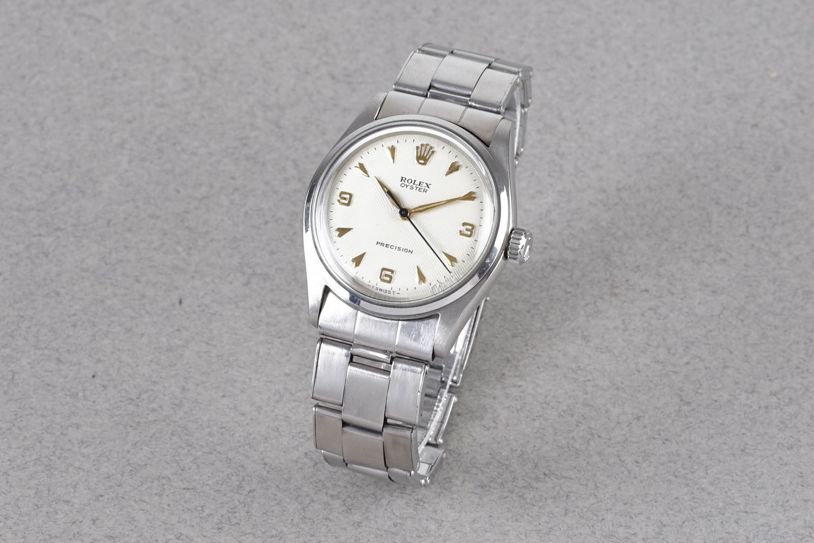 ROLEX 'CHEVRON' DIAL OYSTER PRECISION REF. 6282 CIRCA 1963: ROLEX 'CHEVRON' DIAL OYSTER PRECISION REF. 6282 CIRCA 1963, this watch is a ref. 6286 and is fitted with a circular sector textured 'chevron' dial with applied hour markers and hands. The 34mm