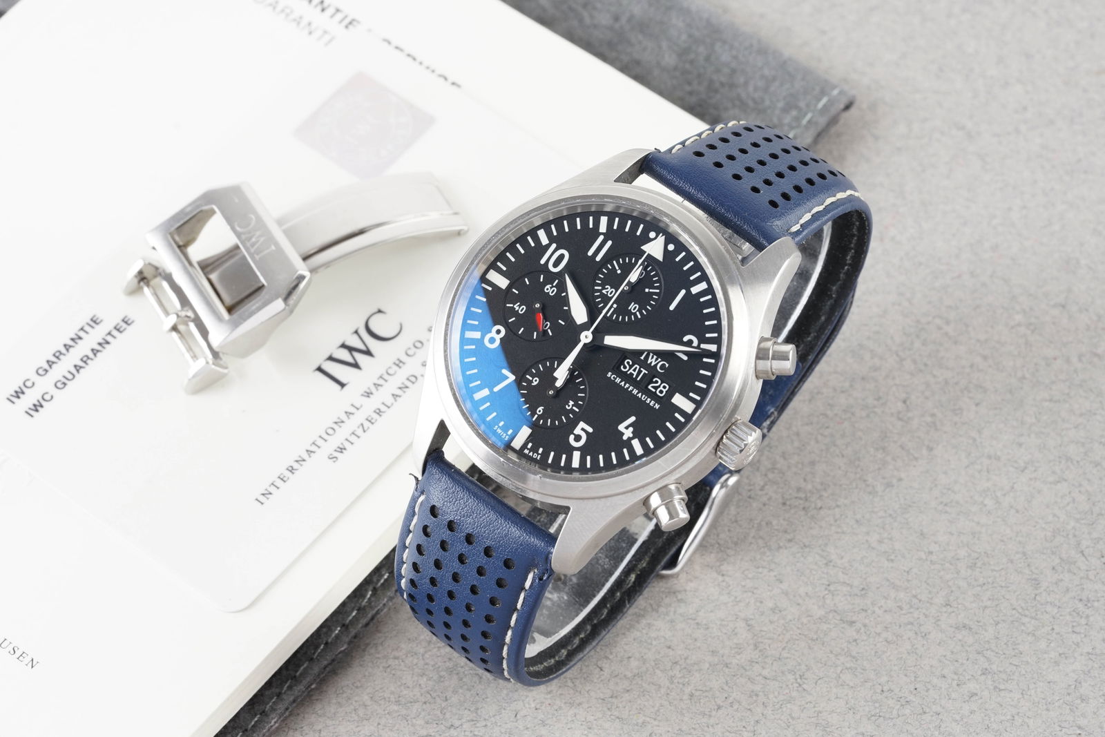 IWC SCHAFFHAUSEN PILOT DAY DATE CHRONOGRAPH W/ GUARANTEE CARD REF. IW371701 CIRCA 2006: IWC SCHAFFHAUSEN PILOT DAY DATE CHRONOGRAPH W/ GUARANTEE CARD REF. IW371701 CIRCA 2006, this watch is a ref. IW371701 and is fitted with a circular black triple register dial with hour markers and