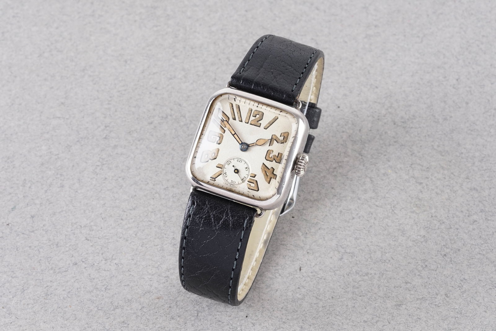 935 SILVER DREADNOUGHT WRISTWATCH CIRCA 1915: 935 SILVER DREADNOUGHT WRISTWATCH CIRCA 1915, this watch is fitted with a rounded square dial with exploding arabic numeral hour markers and cathedral hands. The 33mm 935 silver case is fitted with a