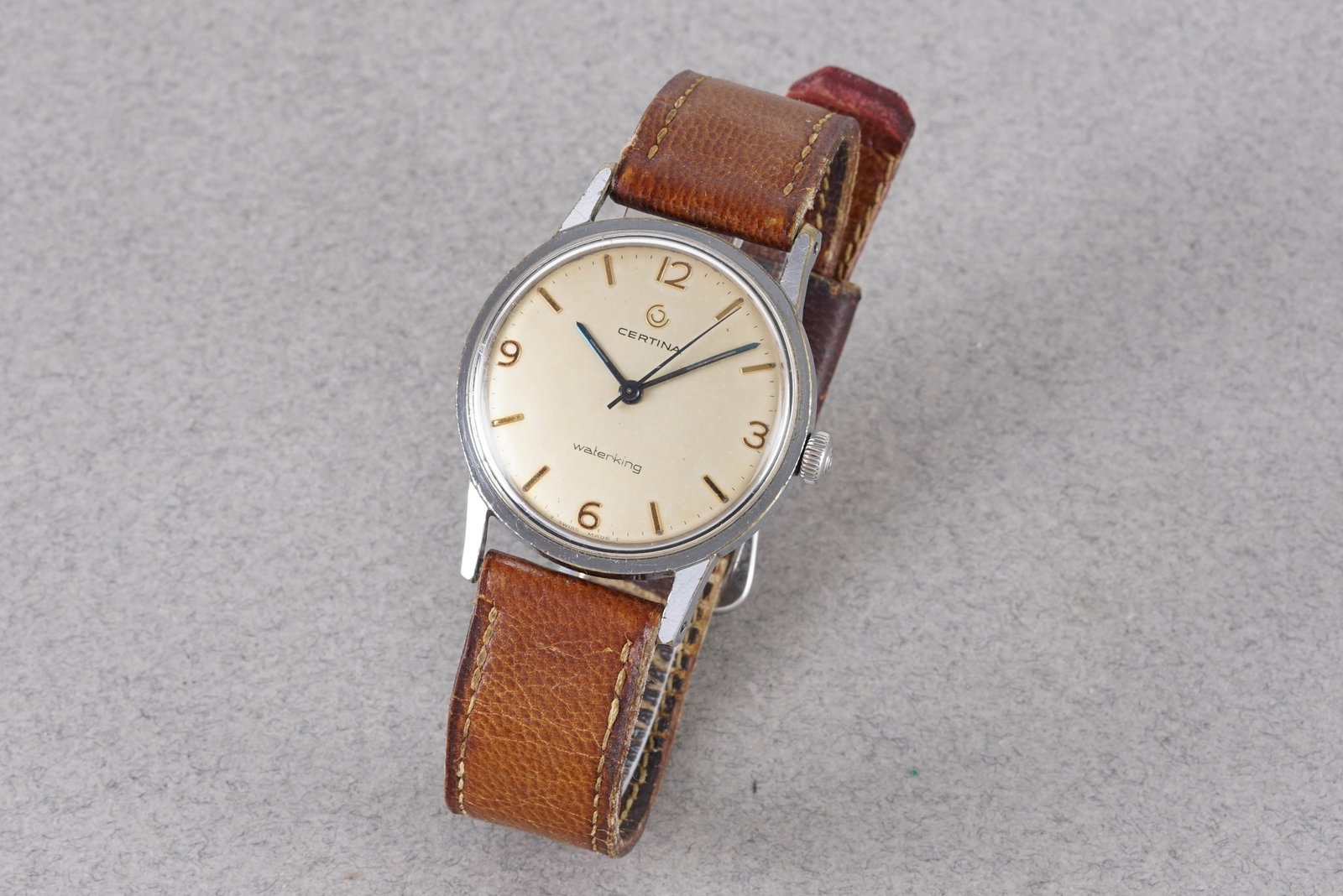CERTINA WATERKING WRISTWATCH: CERTINA WATERKING WRISTWATCH, this watch is fitted with a circular cream dial with hour markers and hands. The 33mm case is fitted with a crown and a case back. Inside is a manually wound movement whi