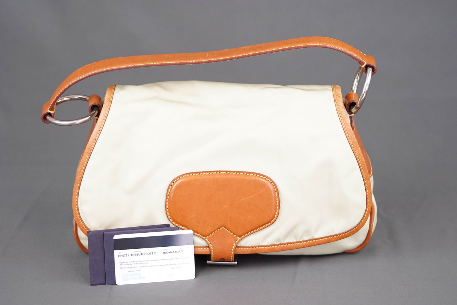 PRADA TWO TONE SHOULDER BAG: PRADA TWO TONE SHOULDER BAG, width 33cm, height 21cm, 12 depth cm. PLEASE NOTE: *This lot is elected for VAT (20%) on the hammer which will not apply for successful bidders outside of the UK