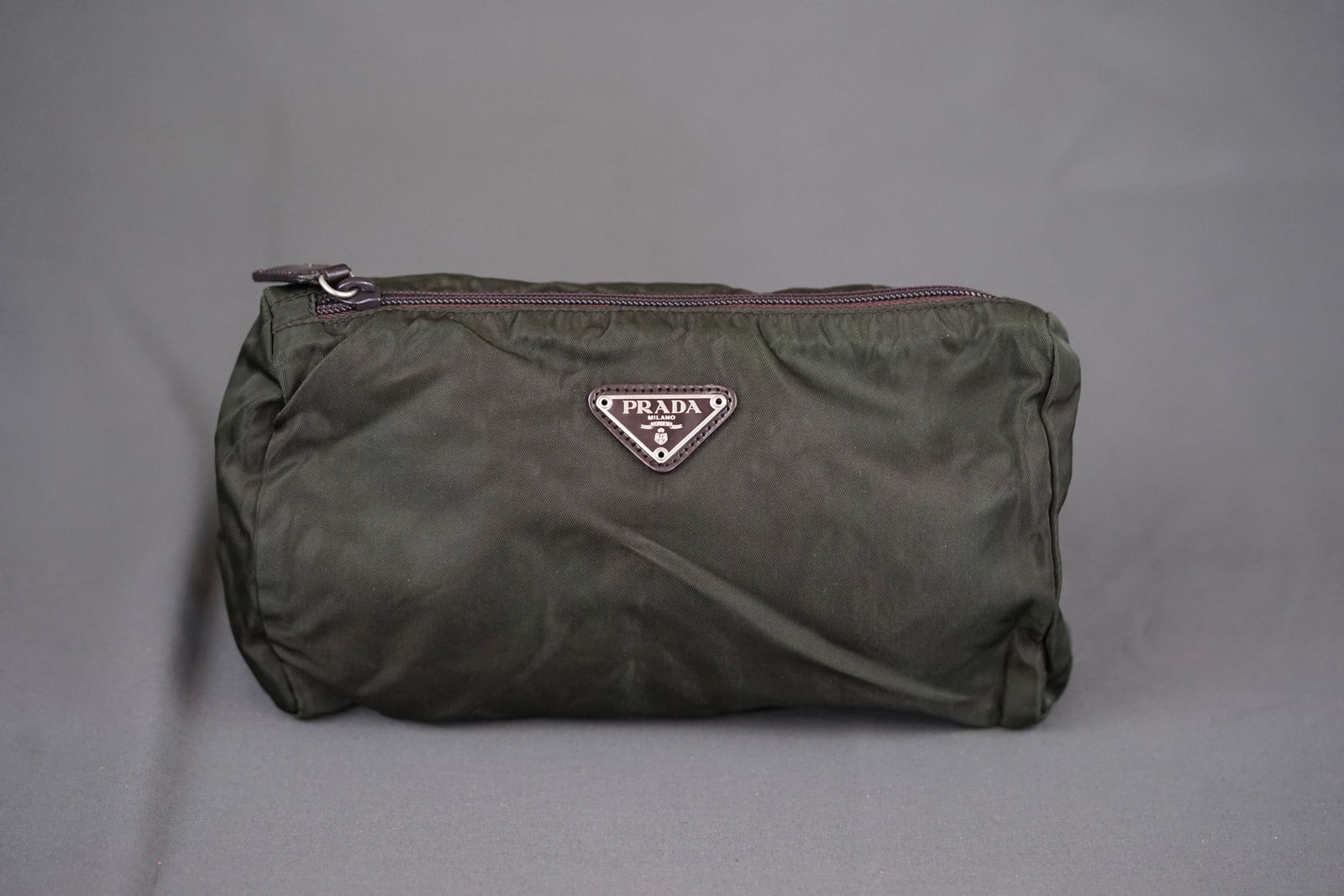 PRADA NYLON POUCH GREEN: PRADA NYLON POUCH GREEN, width 23cm, height 15cm, depth 7cm. PLEASE NOTE: *This lot is elected for VAT (20%) on the hammer which will not apply for successful bidders outside of the UK (exported).