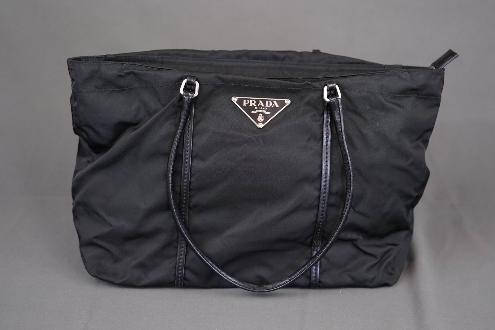PRADA NYLON TOTE POCONO HANDBAG: PRADA NYLON TOTE POCONO HANDBAG, width 30cm, height 25cm, depth 11cm. PLEASE NOTE: *This lot is elected for VAT (20%) on the hammer which will not apply for successful bidders outside of the UK