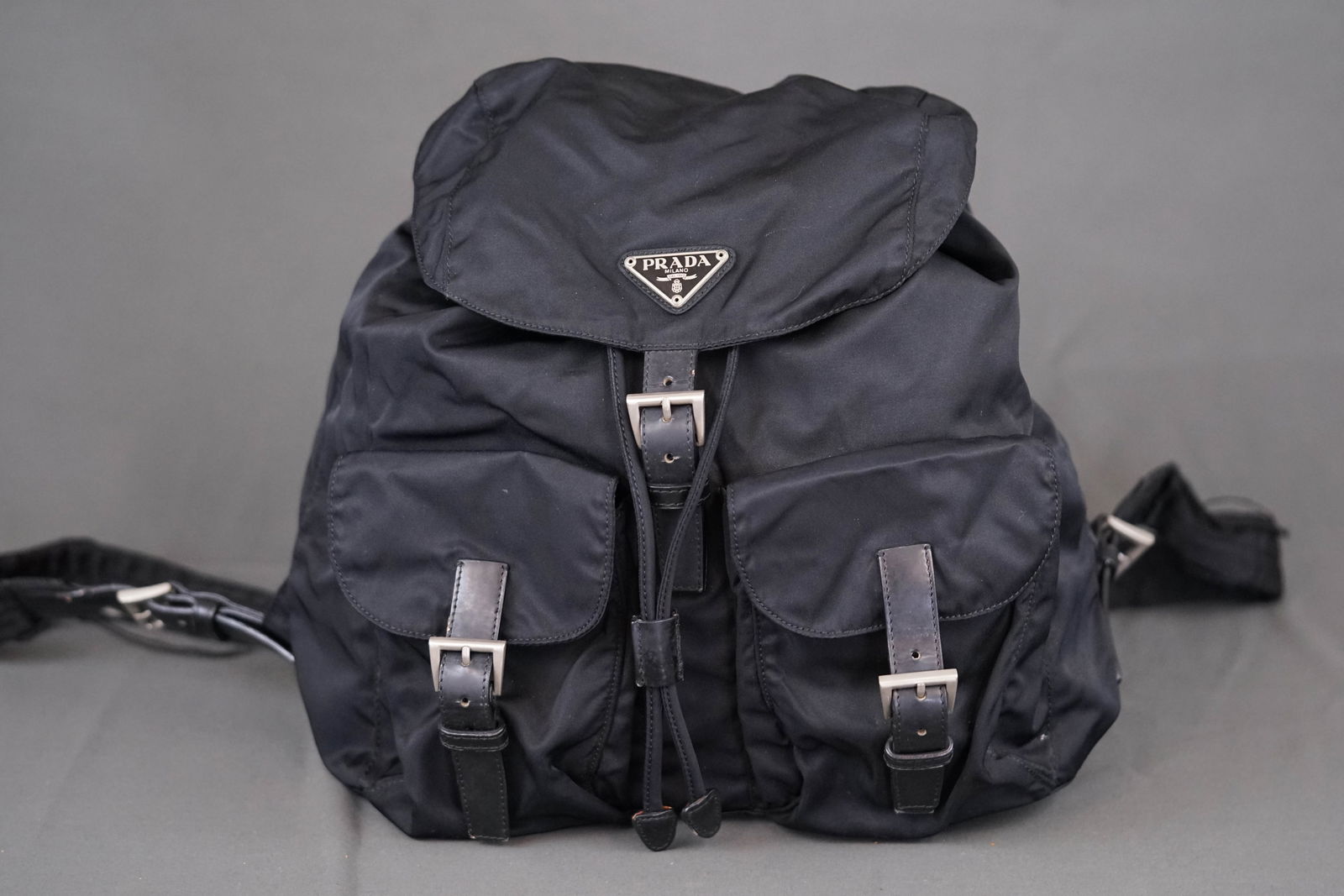 PRADA NYLON BLACK BACKPACK: PRADA NYLON BLACK BACKPACK, nylon, width 28cm, height 28cm, 15 depth cm. PLEASE NOTE: *This lot is elected for VAT (20%) on the hammer which will not apply for successful bidders outside of the UK