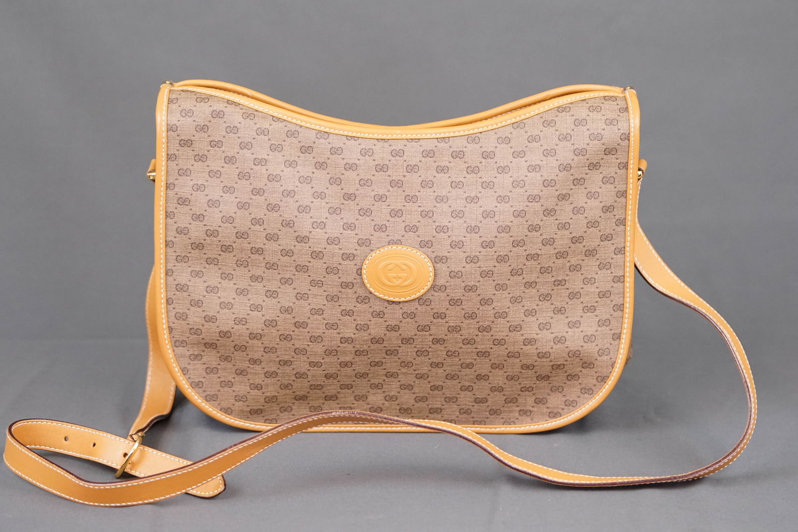 GUCCI SHOULDER BAG: GUCCI SHOULDER BAG, number 001/090/1046, width 30cm, height 21cm, depth 10cm. PLEASE NOTE: *This lot is elected for VAT (20%) on the hammer which will not apply for successful bidders outside of the U