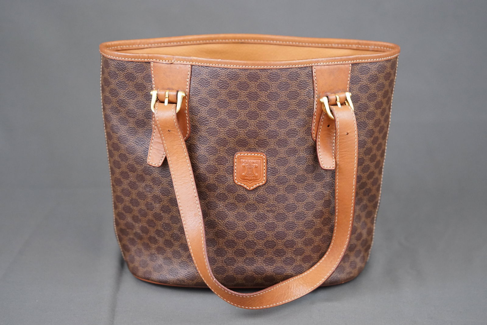 CELINE MACADAM HANDBAG: CELINE MACADAM HANDBAG, MC97/2, width 29cm, height 21cm, depth 1cm. PLEASE NOTE: *This lot is elected for VAT (20%) on the hammer which will not apply for successful bidders outside of the UK