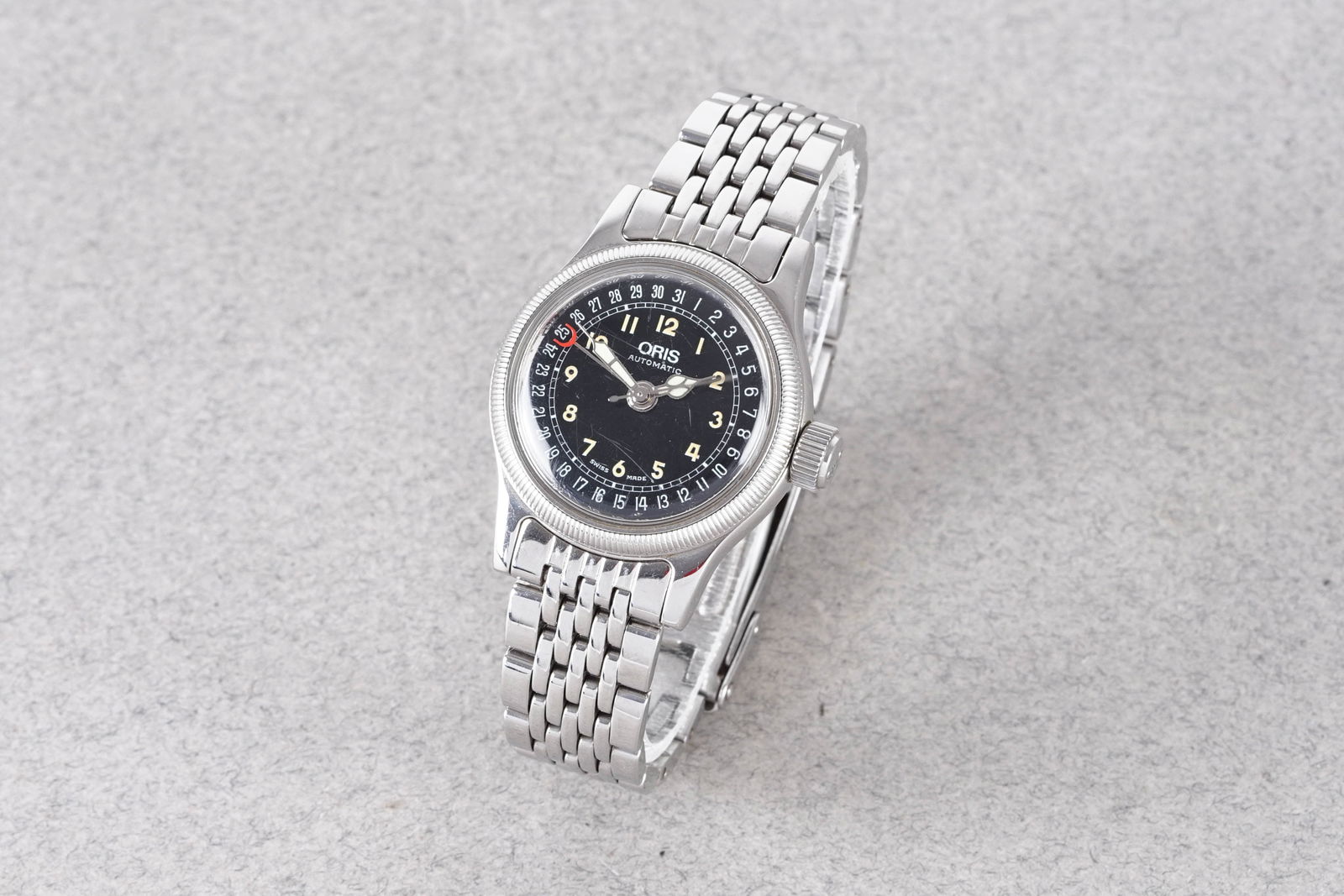 ORIS BIG CROWN AUTOMATIC POINTER DATE WRISTWATCH: ORIS BIG CROWN AUTOMATIC POINTER DATE WRISTWATCH, this watch is fitted with a circular black dial with arabic numeral hour markers and hands. The 28mm stainless steel case is fitted with a crown and