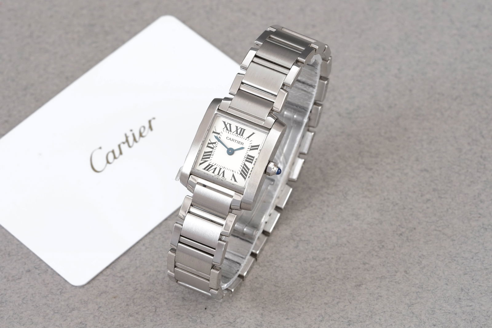 CARTIER TANK FRANCAISE W/ GUARANTEE CARD REF. 451008Q3 CIRCA 2024: CARTIER TANK FRANCAISE W/ GUARANTEE CARD REF. 451008Q3 CIRCA 2024, this watch is a ref. 451008Q3 and is fitted with a square off white dial with roman numeral hour markers and hands. The