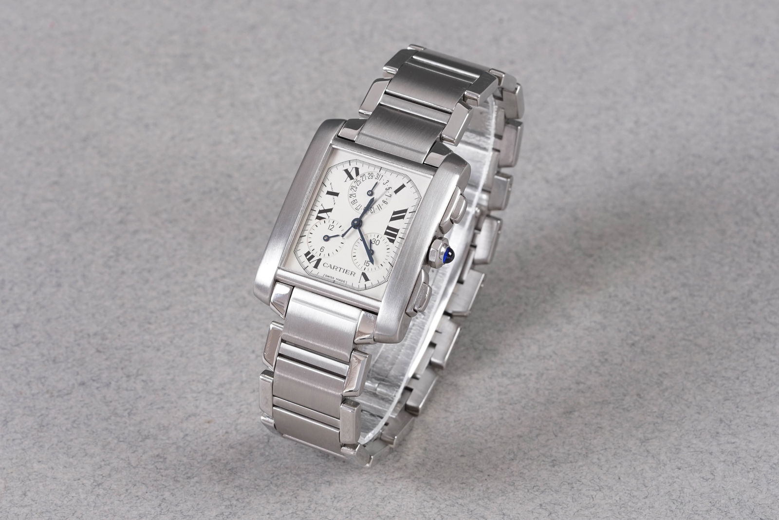CARTIER TANK FRANCAISE CHRONOGRAPH REF. 2303: CARTIER TANK FRANCAISE CHRONOGRAPH REF. 2303, this watch is a ref. 2303 and is fitted with a rectangular off white triple register dial with hour markers and hands. The 28x35mm stainless steel