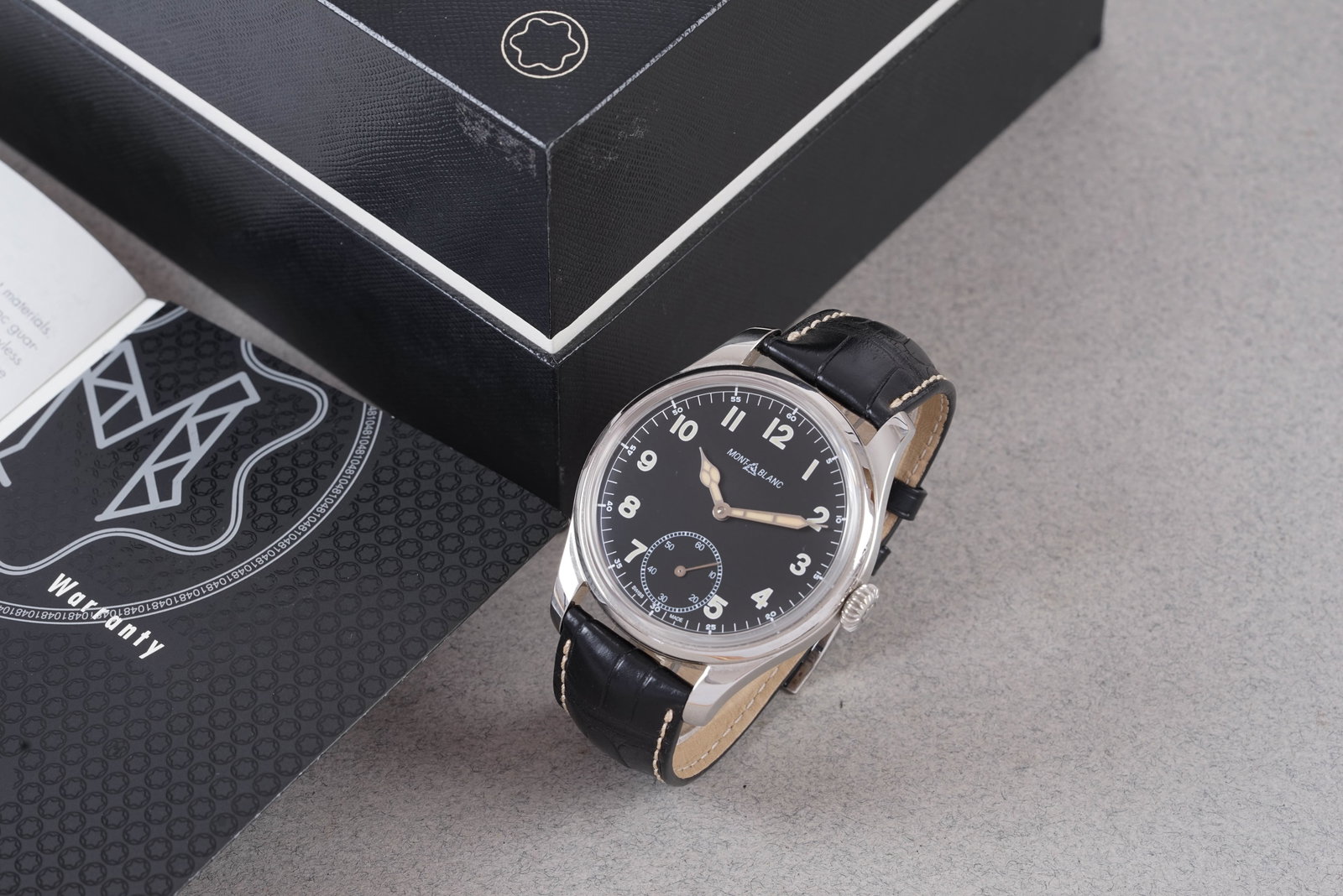 MONT BLANC 1858 AUTOMATIC WRISTWATCH W/ BOX & GUARANTEE PAPERS: MONT BLANC 1858 AUTOMATIC WRISTWATCH W/ BOX & GUARANTEE PAPERS, this watch is a ref. 1858 limited edition 857/858 and is fitted with a circular black dial dial with, number hour markers and retro